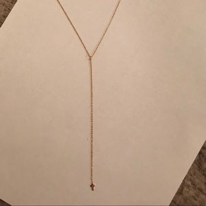 Gold necklace with cross
